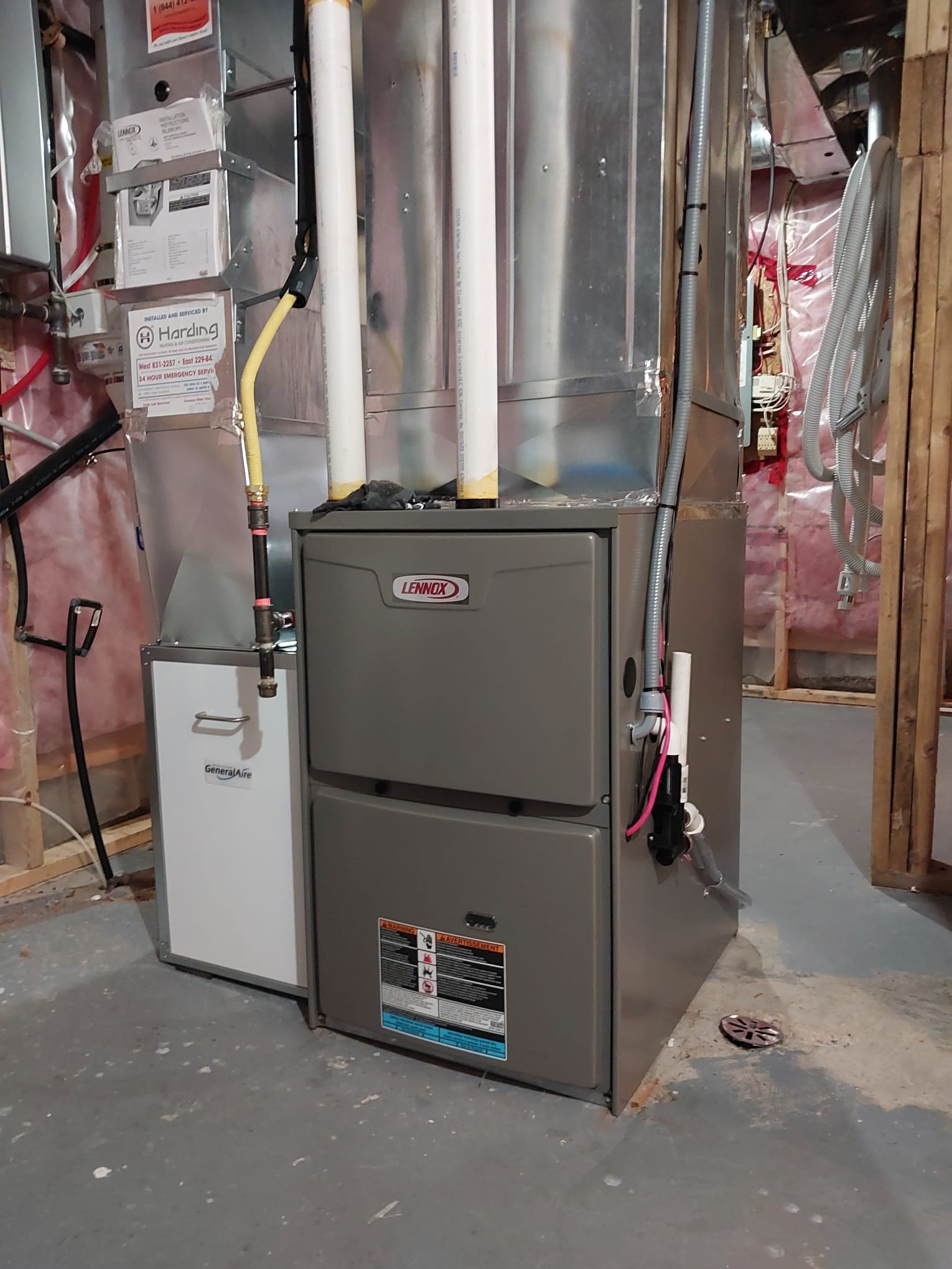 Technician testing furnace components in Goulbourn.