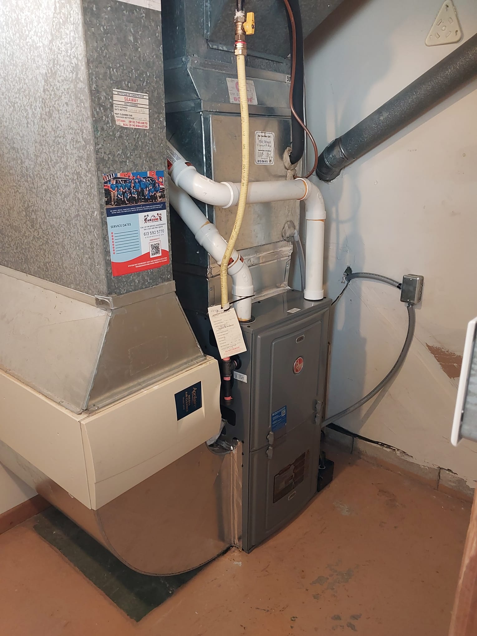 High-efficiency gas furnace installation in an Ottawa basement.